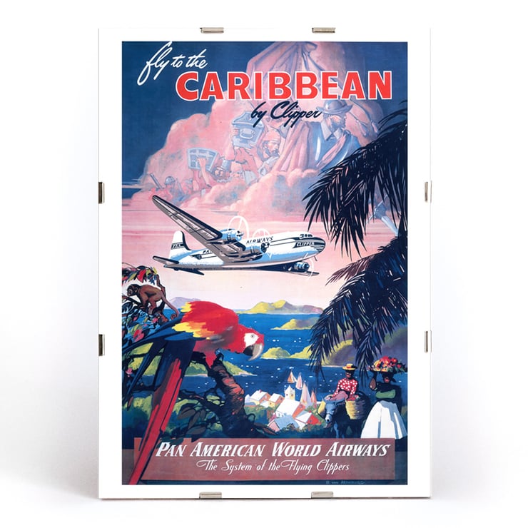 Fly to the Caribbean by Clipper artwork by Mark Von Arenburg depicting Pan American World Airways plane. Poster of Pan American World Airways promoting Caribbean flights by clipper showcasing vibrant tropical scenery by Mark Von Arenburg.