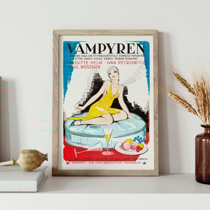 Poster of Vampyren featuring a woman in a yellow dress with A Daughter of Destiny by Eric Rohman. Poster titled A Daughter of Destiny by Eric Rohman features a stylish woman in a yellow dress sitting on a circular seat.