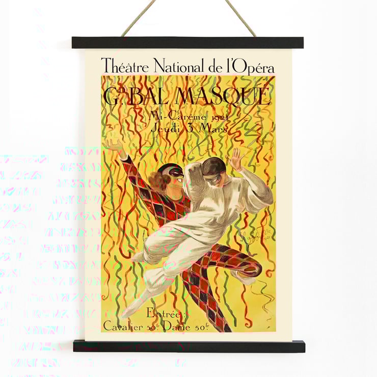 Colorful masquerade ball poster by Leonetto Cappiello titled Théâtre National De L’opéra Grand Bal De La Mi-Carême featuring dancers with vibrant streamers Poster of two masked dancers surrounded by colorful streamers at the Grand Bal by Leonetto Cappiello.