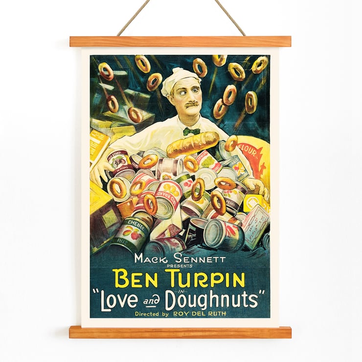 Love and Doughnuts by artist featuring a baker surrounded by flying doughnuts and canned goods Poster for the film Love and Doughnuts featuring a chef surrounded by flying doughnuts and canned goods.