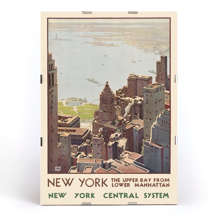 Aerial view of Lower Manhattan and Upper Bay painted by Leslie Ragan in the artwork New York Central System. Poster of New York skyscrapers and bay view from Lower Manhattan by artist Leslie Ragan titled New York Central System.