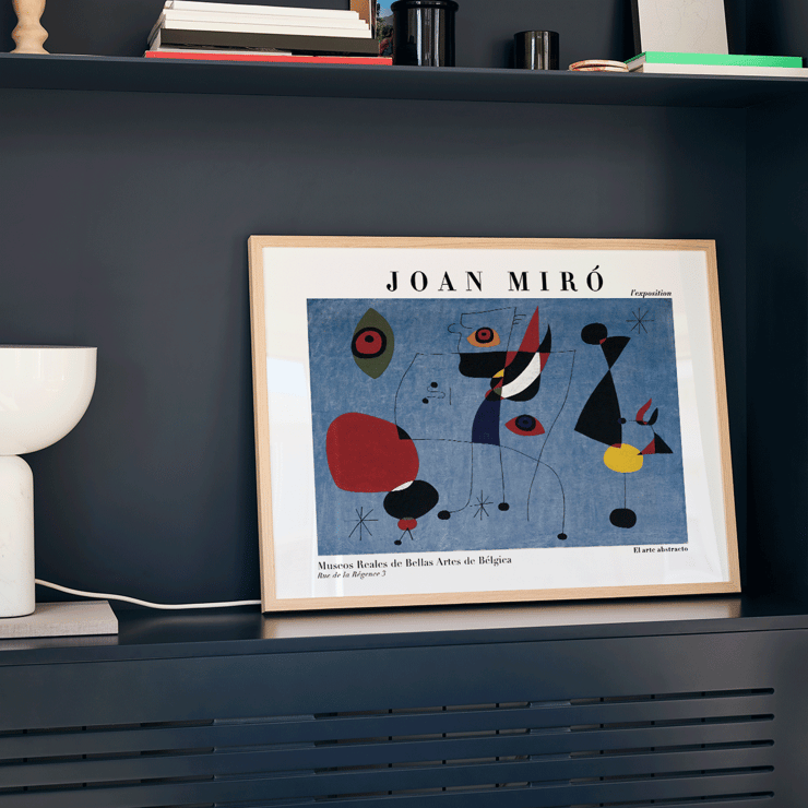 Exhibition poster featuring colorful abstract artwork Woman and Bird at Night by Joan Miro Poster of abstract artwork Woman and Bird at Night by Joan Miro featuring colorful shapes on a blue background