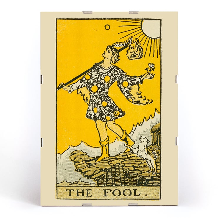 The Fool tarot card illustration by Lauron William de Laurence featuring a whimsical character and a small dog on a cliff. The Fool tarot card poster by Lauron William de Laurence depicts a figure on a cliff with a dog beneath a bright yellow background.