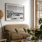 Poster featuring a black and white landscape of Lisbon's old city with rooftops and historic buildings titled Lisbon Old City Landscape