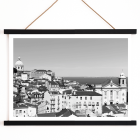 Poster featuring a black and white landscape of Lisbon's old city with rooftops and historic buildings titled Lisbon Old City Landscape