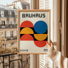 Bauhaus Poster 18 featuring bold geometric shapes and primary colors in a minimalist design with text Bauhaus at the top.