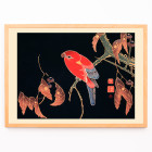 Perroquet rouge sur la branche d&#39;un arbre