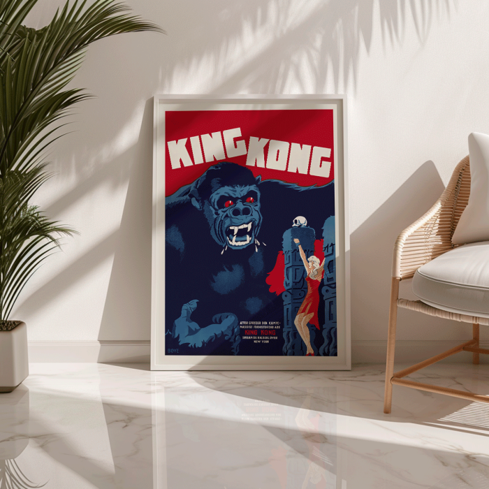 King Kong movie poster by Boye featuring a giant gorilla with red eyes grabbing a building with a woman in a red dress holding her hand up