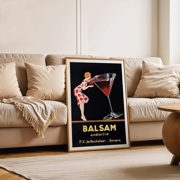 Póster de Balsam Aperitif de Jean d'Ylen que presenta a una mujer bebiendo de un vaso gigante con un contenido rojo vibrante.