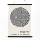 Riley Blaze Exhibition Poster by Bridget Riley featuring black and white spiral geometric design on a light background.