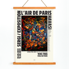 Affiche de l'exposition L'Air de Paris présentant l'œuvre abstraite Le Concert de Hulusi Mercan avec des instruments de musique et des couleurs vives.